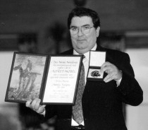John Hume displays Nobel Peace Prize medal and certificate